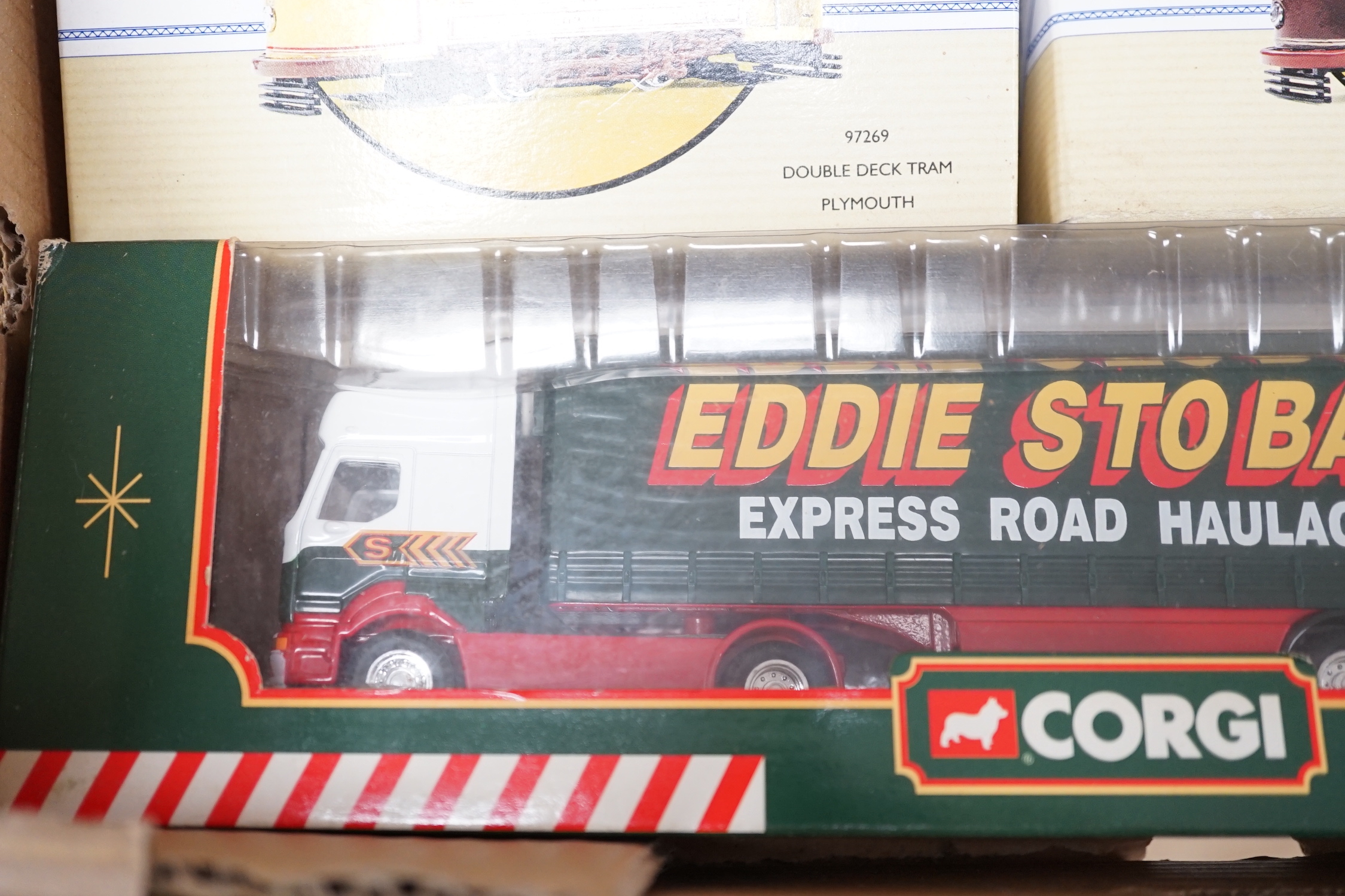 Eight boxed Corgi toys and two other die-cast models including; Eddie Stobart commercial vehicles, two Guy Arab buses, two double deck trams, etc.